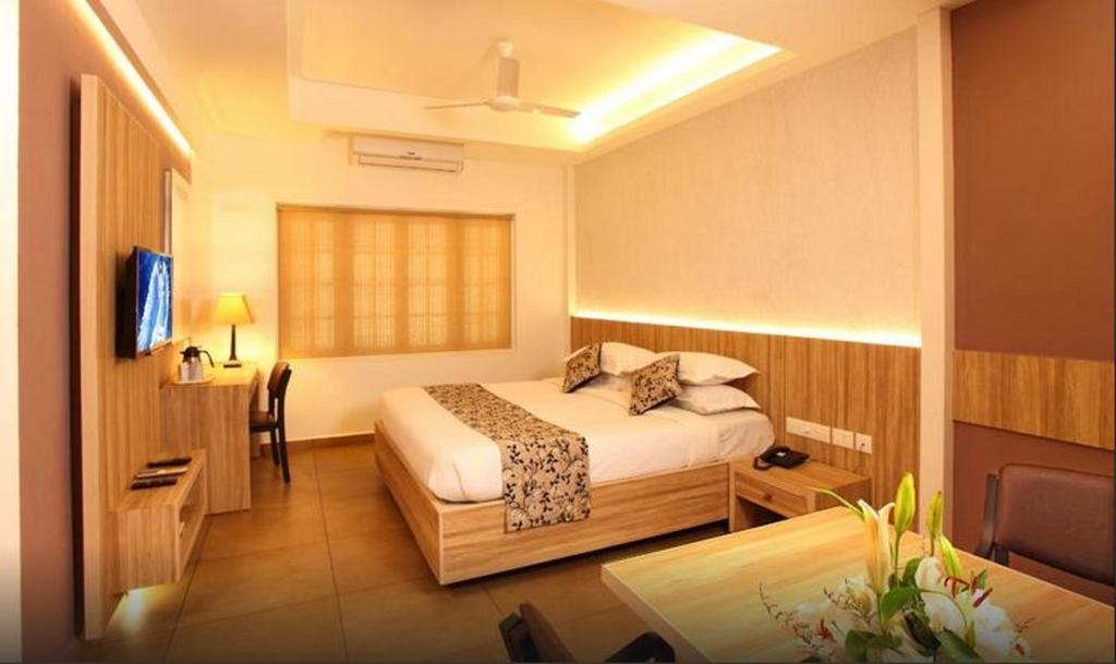 Hotel Luciya Palace Thrissur Номер фото